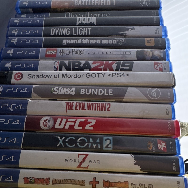 Sony PS4 Game Lot w/ Cases: Bloodborne DOOM Lego Harry Potter Collection Xcom2