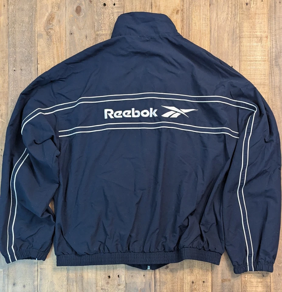 Chaqueta cortavientos vintage Reebok cremallera completa para hombre XL azul Foto 2 de 4