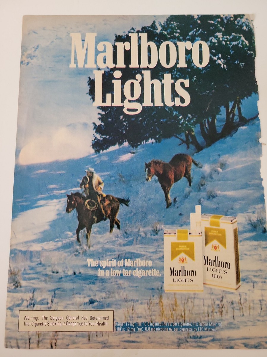 1980 Marlboro lights 100s cigarettes cowboys riding horses down
