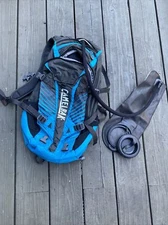 Camelbak K.U.D.U. 18 100oz Char/Atomic Blu Used W/impact Protector T51