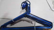 CLOTHS HANGERS..LOT OF 12.... 16" ACROSS.  SHADES OF BLUE