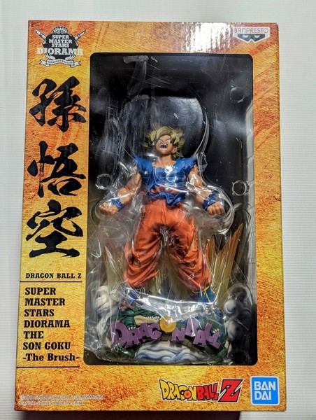 Banpresto - Figura DBZ - Son Goku Super Saiyan Super Master Stars Piece Diorama