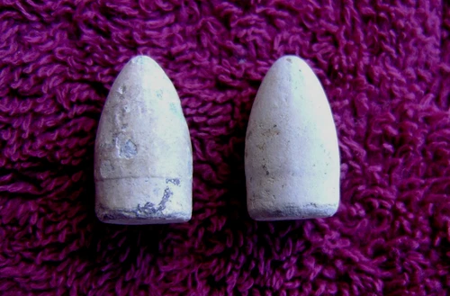 (2) DUG NICE CIVIL WAR .44 CALIBER COLT DRAGOON PISTOL BULLETS (CORINTH)