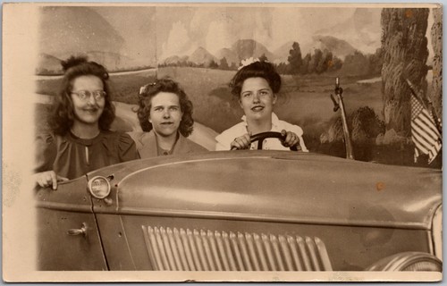 RPPC POSTCARD CIRCA 1920s LADIES DRIVING PROP CAR AMERICAN FLAG PATRIOTIC