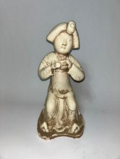 chinese lady playing harmonica