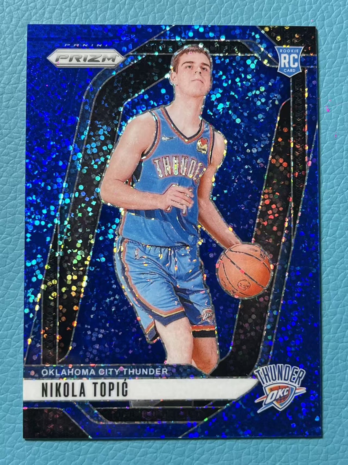 Nikola Topic 2024-25 Panini Prizm 048/144 Blue Sparkle Rookie RC Thunder #230