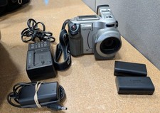 2003 Canon Optura Camcorder Bundle With Two Batteries Charger With Dc Coupler