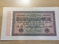 A 1923 Germany 20,000 Mark Reichsbanknote near Used folds but still crisp low SN