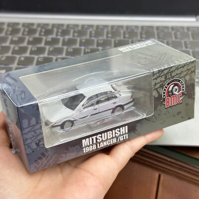 Diecast Car 1/64 Scale Mitsubishi 1988 Lancer Gti White LHD