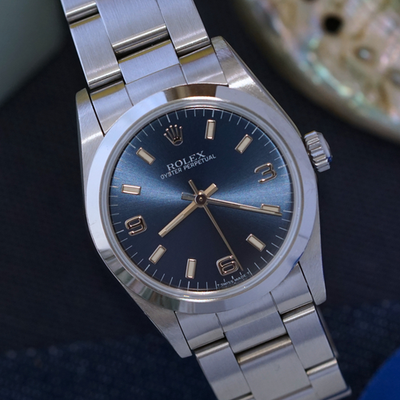 Rolex Oyster Perpetual 67480 Steel Blue Dial 31mm Automatic Hang
