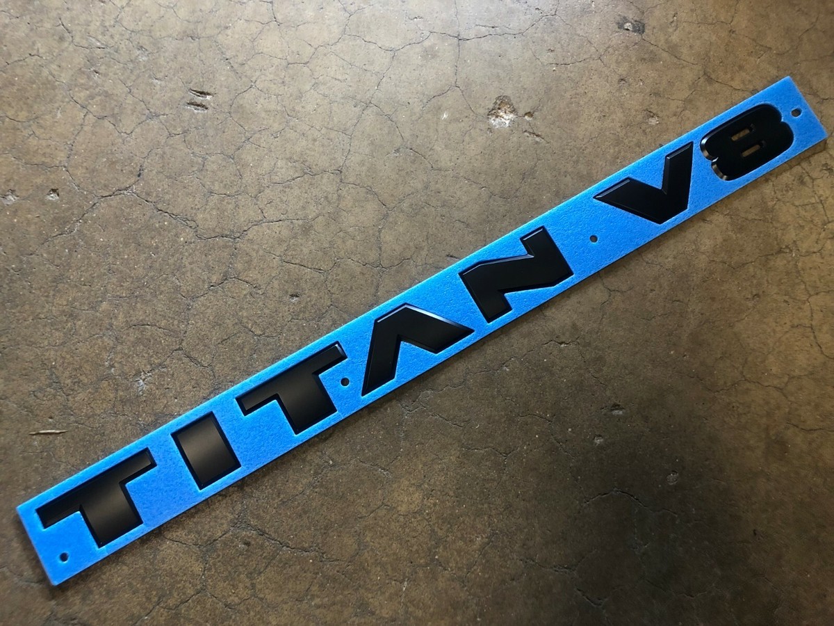 NEW OEM NISSAN TITAN MIDNIGHT BLACK DOOR EMBLEM 