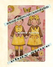 Sister bee metal sign matching dresses yellow dresses