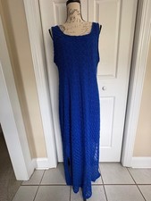 Lovely sleeveless maxi dress in a beautiful blue lace fabric. Size XL.
