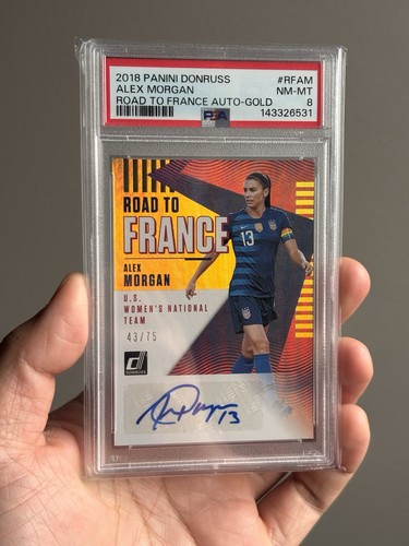 2018 Donruss Road To France Alex Morgan Gold Auto /75 PSA 8 - Afbeelding 1 van 2