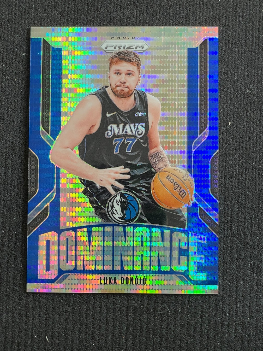 Luka Doncic 2024-25 Panini Prizm Dominance Blue Pulsar /99 #12