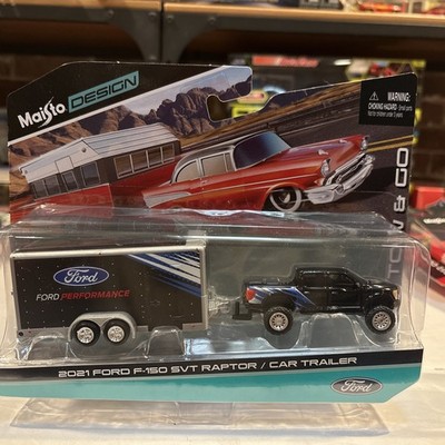 TOW & GO MAISTO DESIGN 2021 FORD F-150 SVT RAPTOR W/ CAR TRAILER