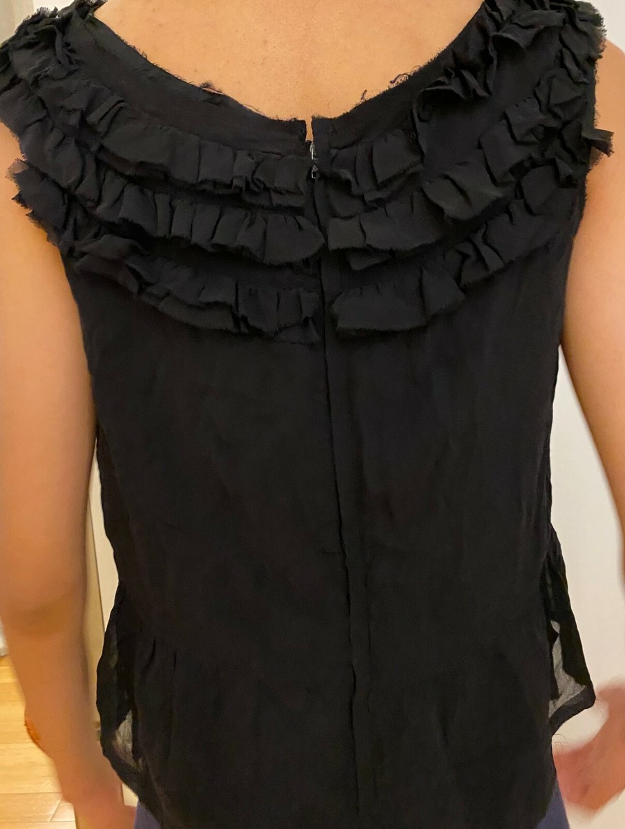 black sleeveless ruffle top