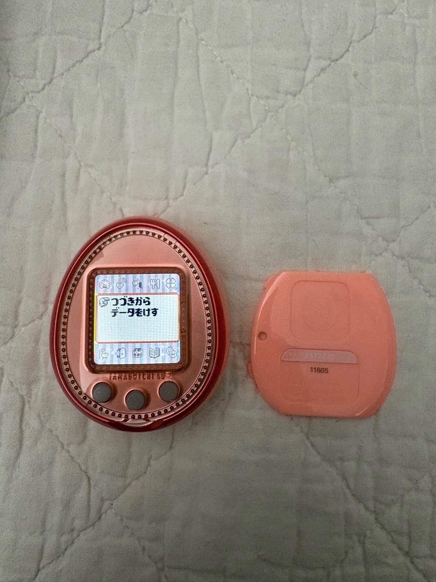 LIGHTLY USED RARE TAMAGOTCHI 4U PLUS IN PEACHY ORANGE in ORIGINAL