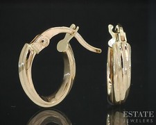 14k Yellow Gold Twisted Oval Hoop Ladies Earrings 1.2g i19029b