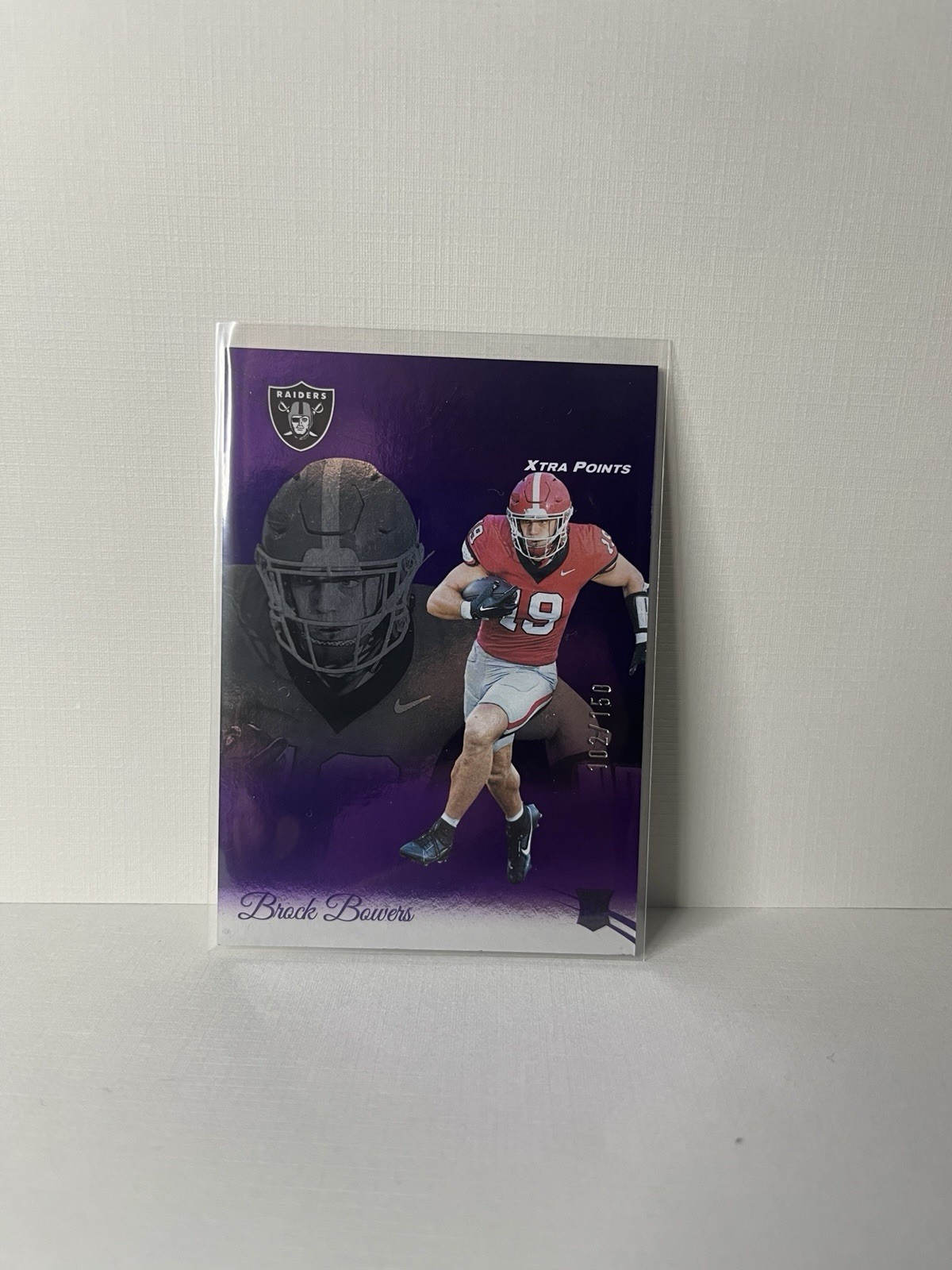 2024 Panini Prestige - Rookies Brock Bowers #305 Xtra Points Purple /150 (RC)