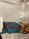 White vintage cycling jersey with red, blue, and yellow arm panel, white “Le Choix” text, and black bike graphic.