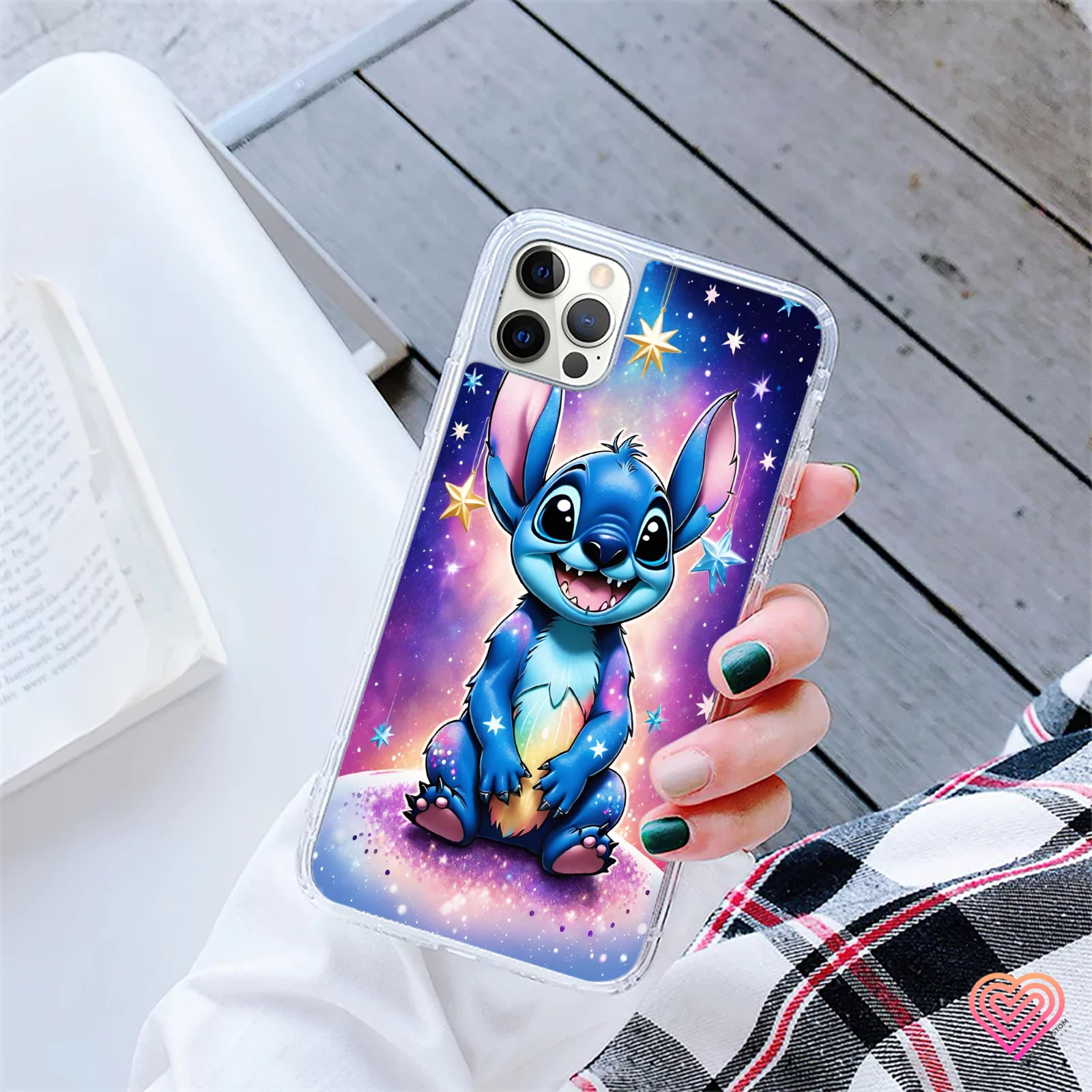 Stitch phone case with blue printed glitter design, glossy finish