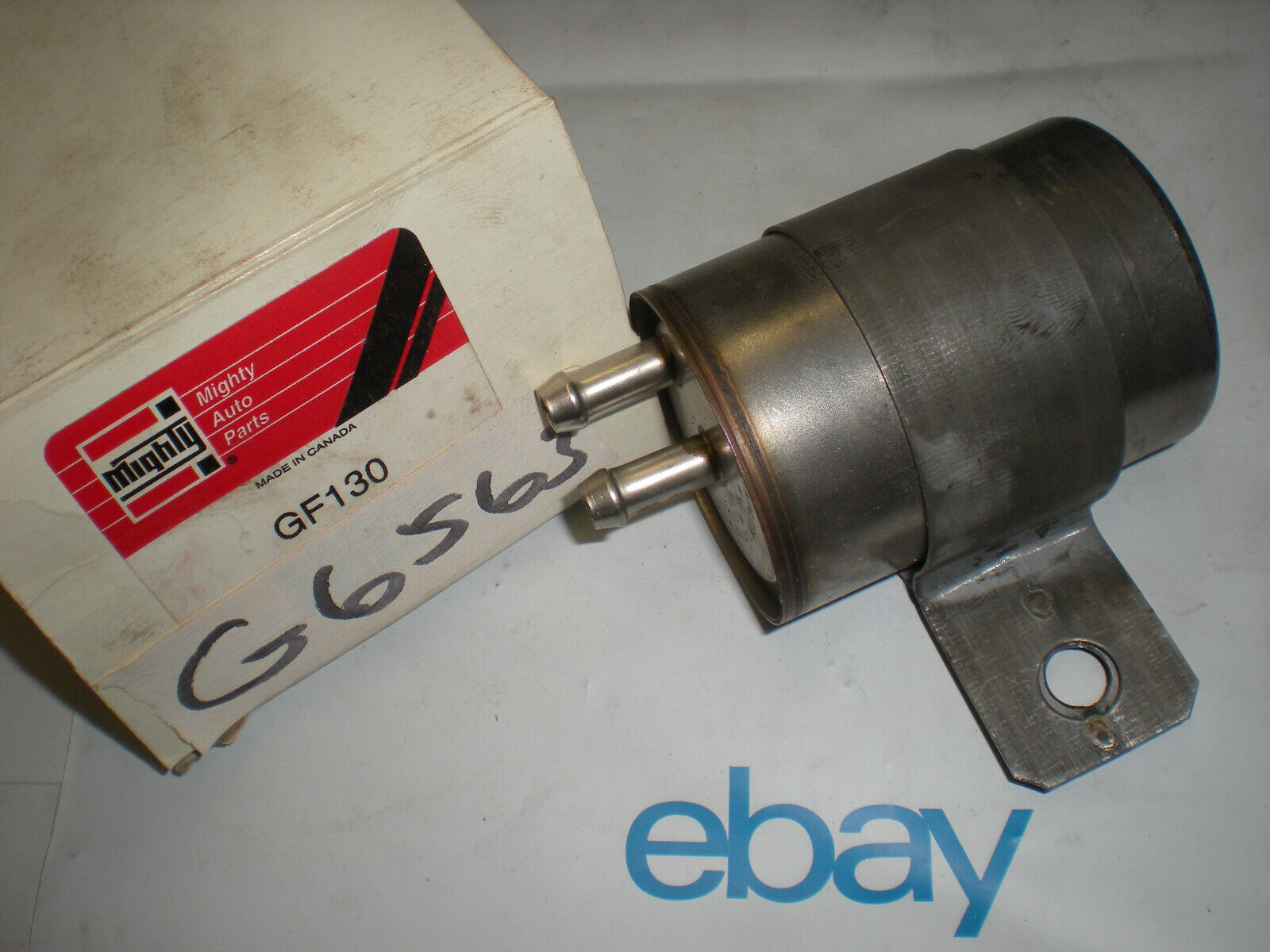 MIGHTY FUEL FILTER  G6563  *DENTED SEE PICS*
