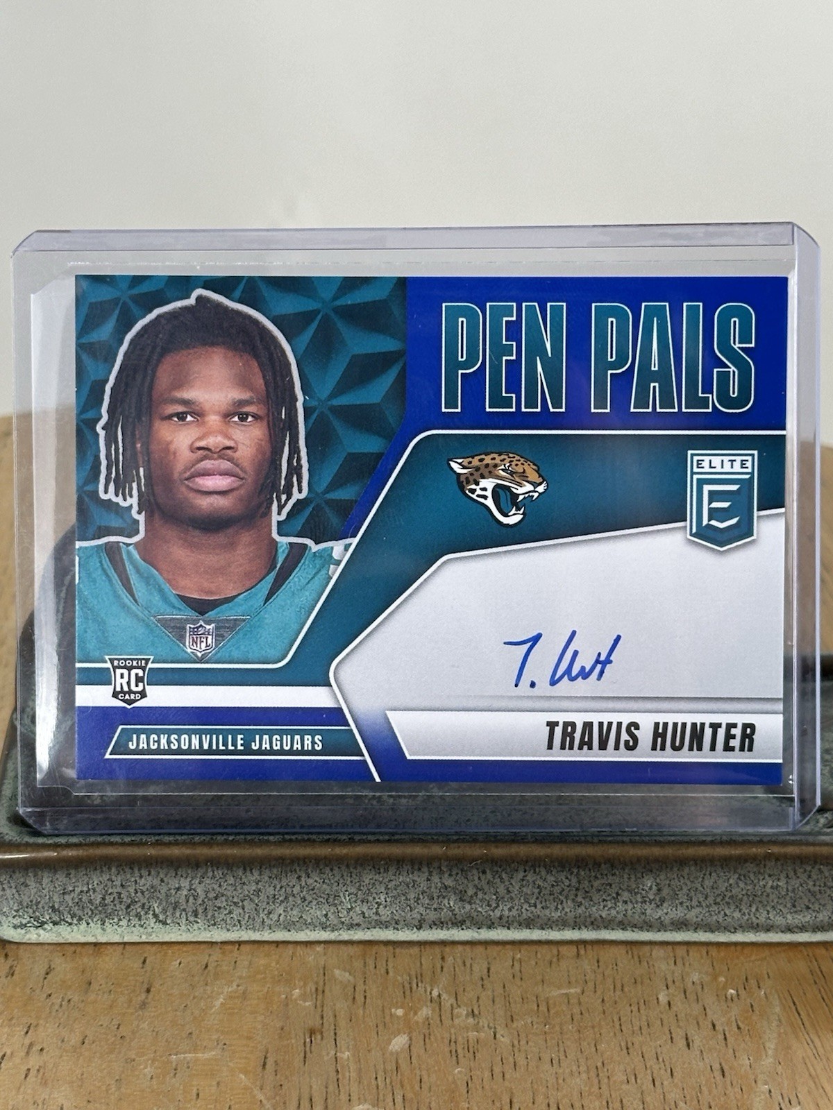 2025 Panini Donruss Elite Travis Hunter Pen Pals Rookie Auto Blue Ink RC Jaguars