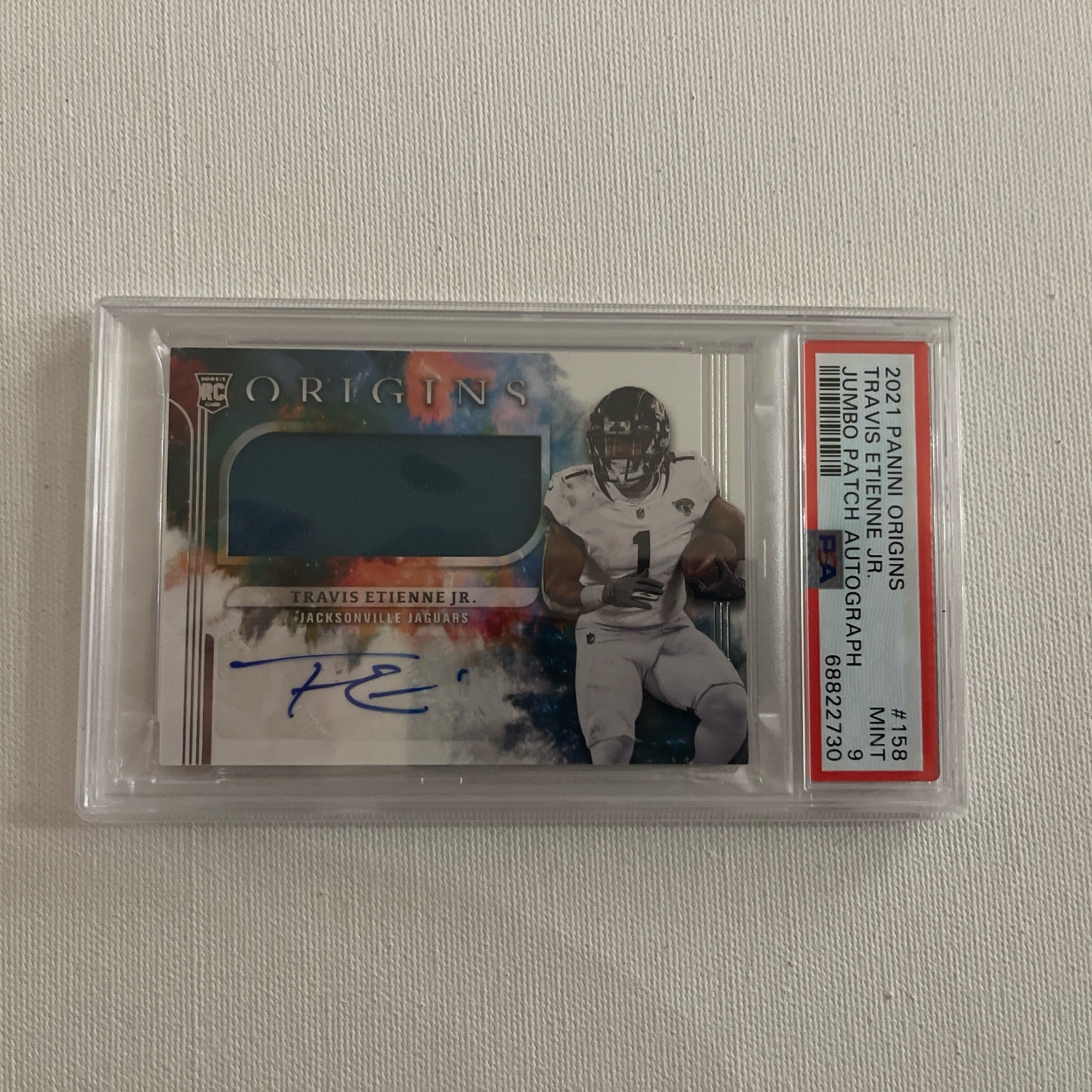 2021 Panini Origins - Rookie Jumbo Jersey Autographs Travis Etienne #158 PSA 9