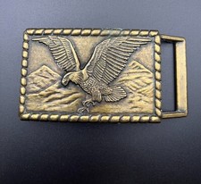 Vintage Eagle Flying in Front of Mountains Brass Belt Buckle