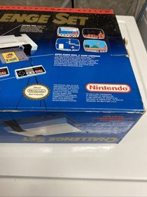 Nintendo NES Challenge Set.  Box, Manual, Console, Power Adapter And Game Genie.
