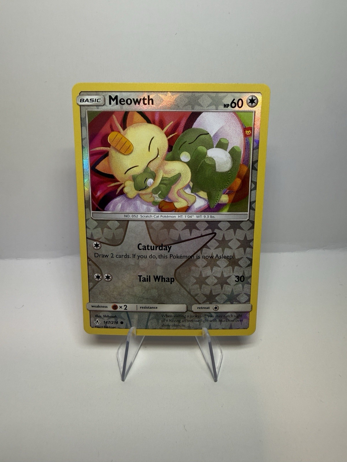 Meowth 147/214 Unbroken Bonds Pokemon Reverse Holo Near Mint