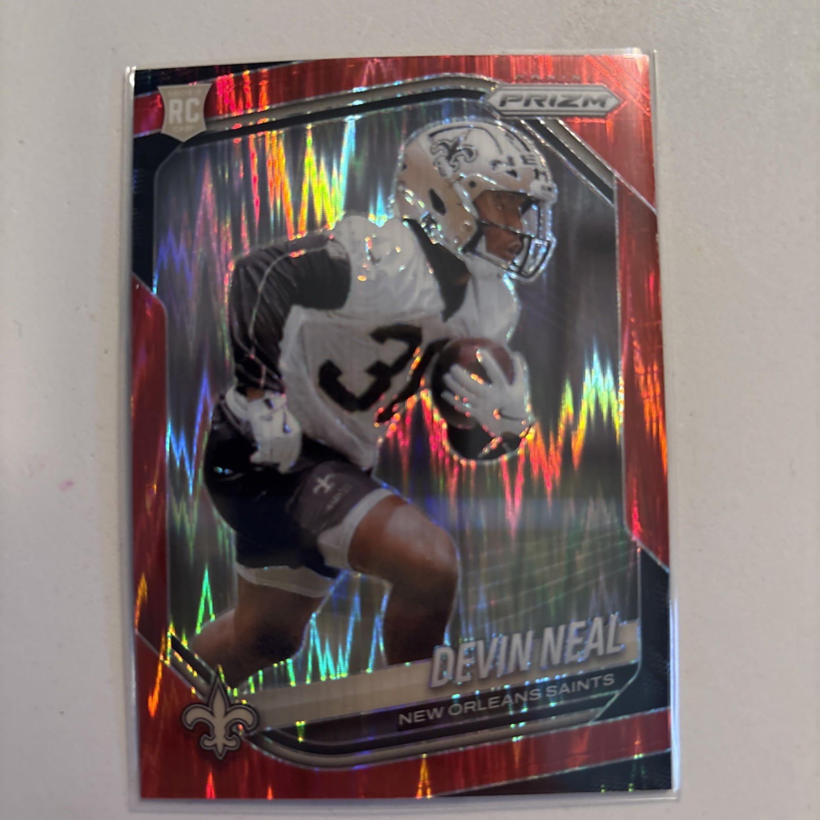 2025 Panini Prizm - Rookies Devin Neal #393 Red Flash (RC) New Orleans Saints