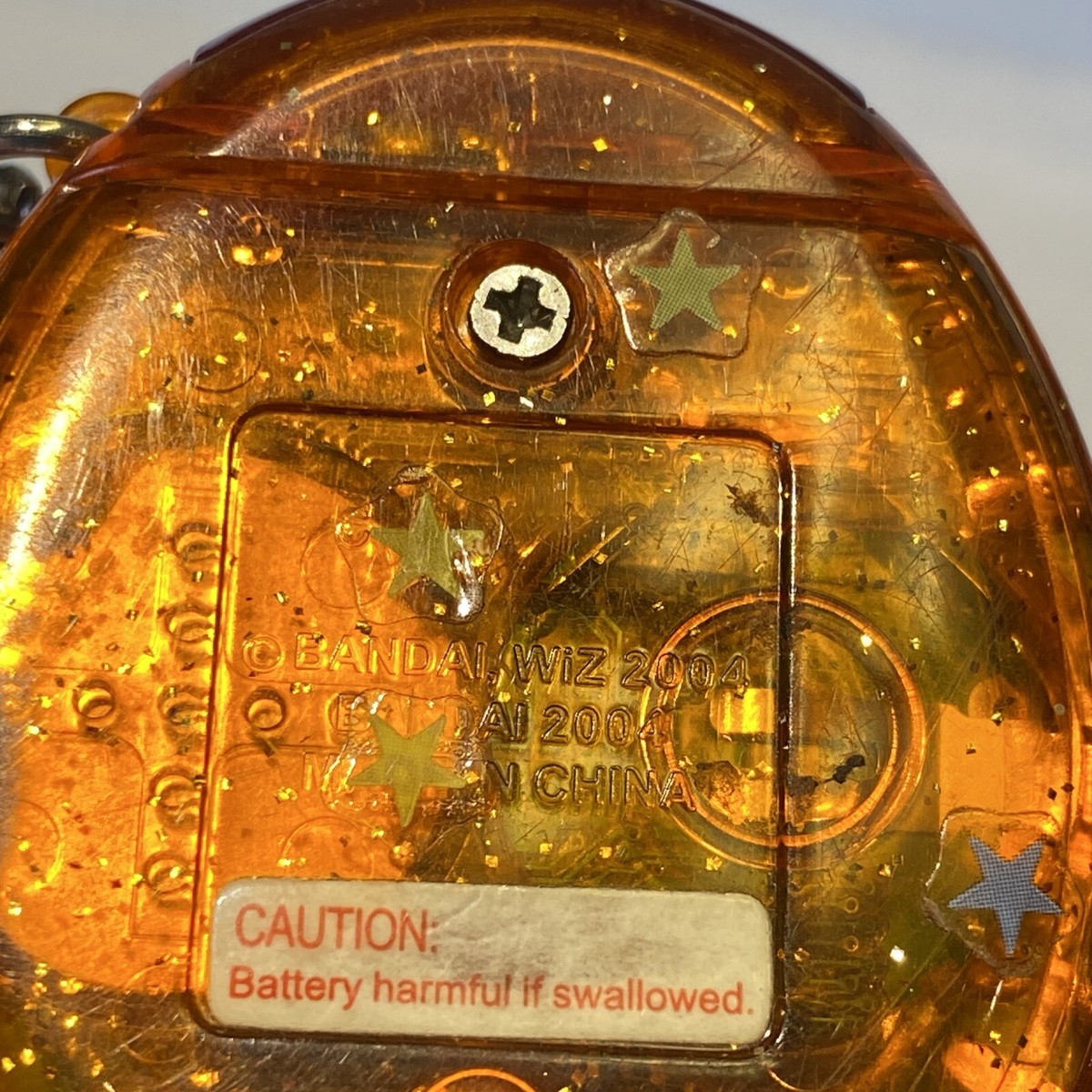 たまちゃん　トナー1 シー1 ハイドレ1 tamagotchi connection V1 orange clear/transparent with sparkles