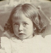 CUTE LITTLE GIRL WITH SHY EXPRESSION. PHOTO IN PHOTO FOLDER.
