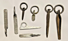 Vintage pitons--8 assorted metal rock anchors with rope rings, in one lot