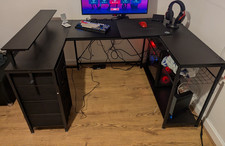 Black L-Shaped Computer Desk with Drawers and Shelves