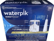 Waterpik Ultra Plus and Cordless Enhance 3000Water Flosser Combo Pack