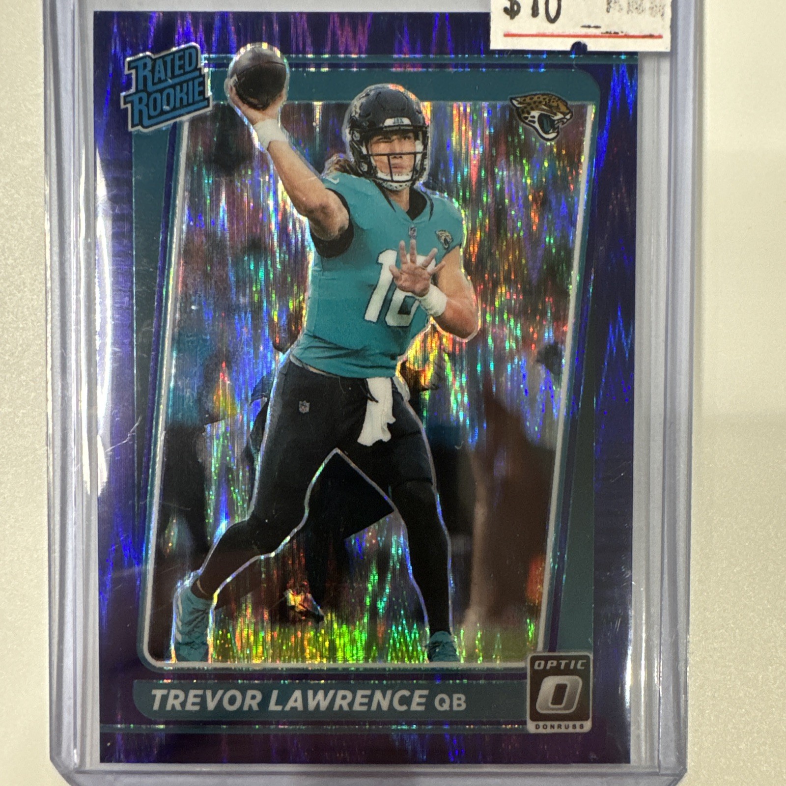 2021 Panini Donruss Optic Purple Shock Prizm #201 Trevor Lawrence RC Jaguars