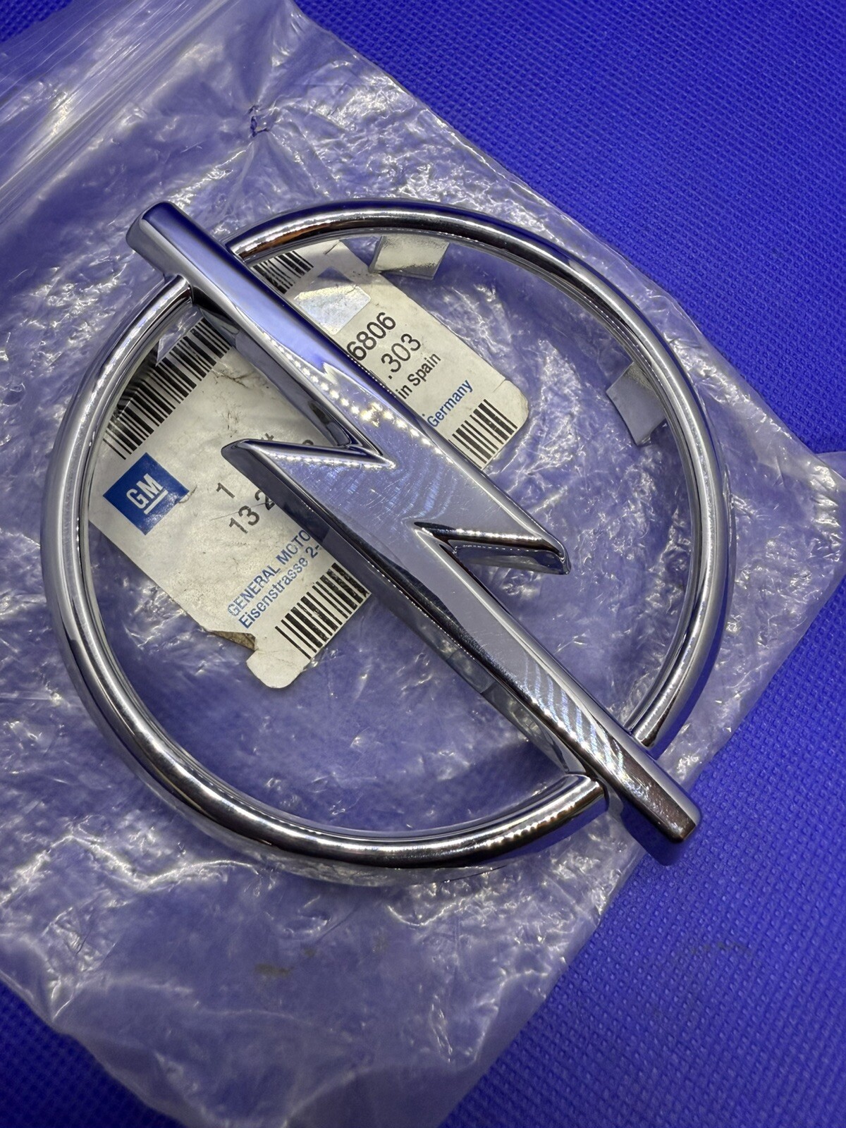 Logo de capot Opel Zafira original 09181969 pour emblème avant d'origine gris chromé