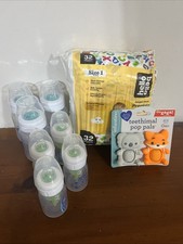 Lot Of Baby Items 7 Feeding Bottles 32 count hello Bello Diapers teething toy