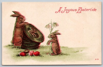 Vintage Postcard A Joyous Eastertide Bunnies Hat Easter Eggs *7917