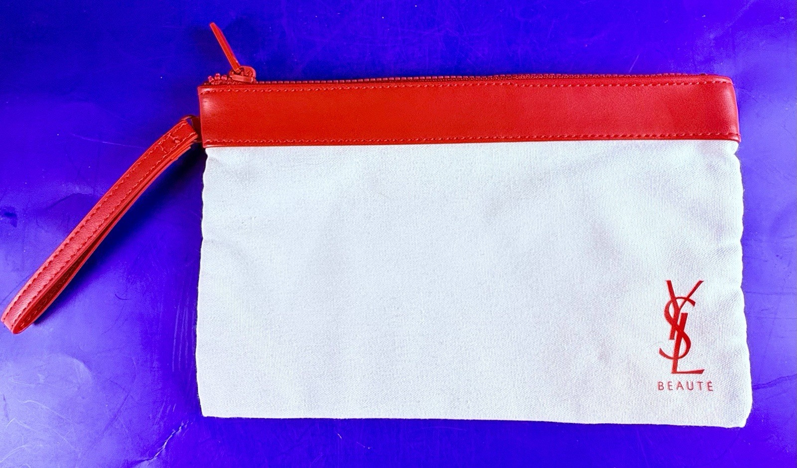 Borsa cosmetica YSL Yves Saint Laurent beige da polso rossa con cerniera marsupio trucco