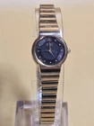 Vintage Seiko Ladies' 19mm Black Dial Gold Tone Stainless Steel Watch. 7" Band.