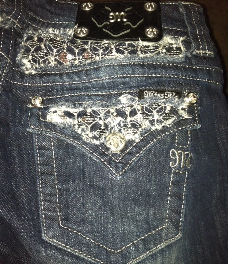 Skinny jeans with bling on best sale back pockets