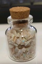 Glass bottle of COOBER PEDY AUSTRALIAN OPAL CHIPS beautiful flashes of colour