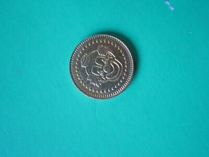 Machine  AND JUKE BOX TOKENS  1  or  1000