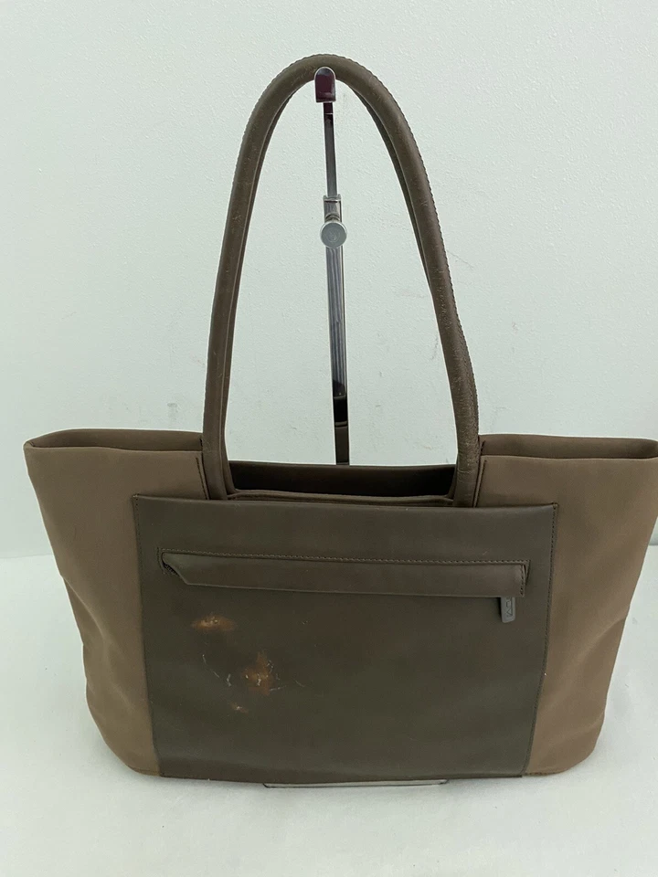 Bolso de hombro Tumi de cuero marrón y nailon Foto 3 de 4