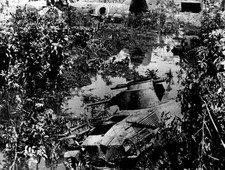 Japanese tank wrecked during fighting at Peleliu in Paluan group o- Old Photo