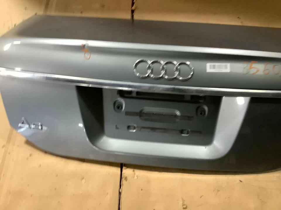 Audi A6 C6 2008 puerta trasera maletero tapa carcasa panel gris con emblema OEM+ Foto 3 de 4